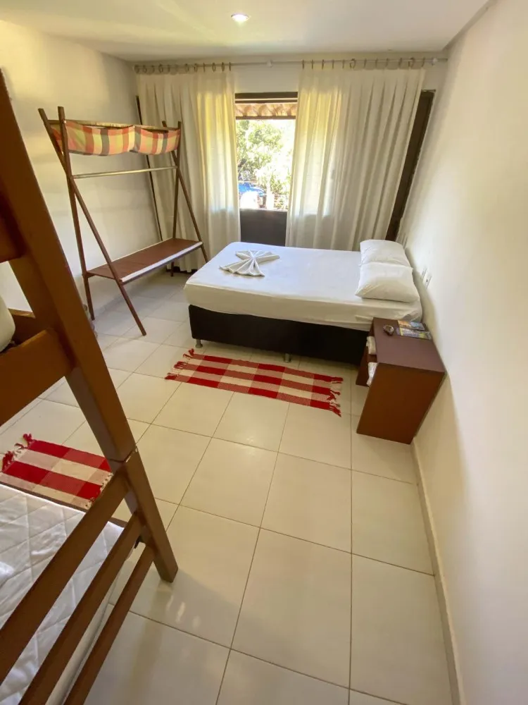 Suite 2 at Iduna Hostel with a double bed and bunk bed